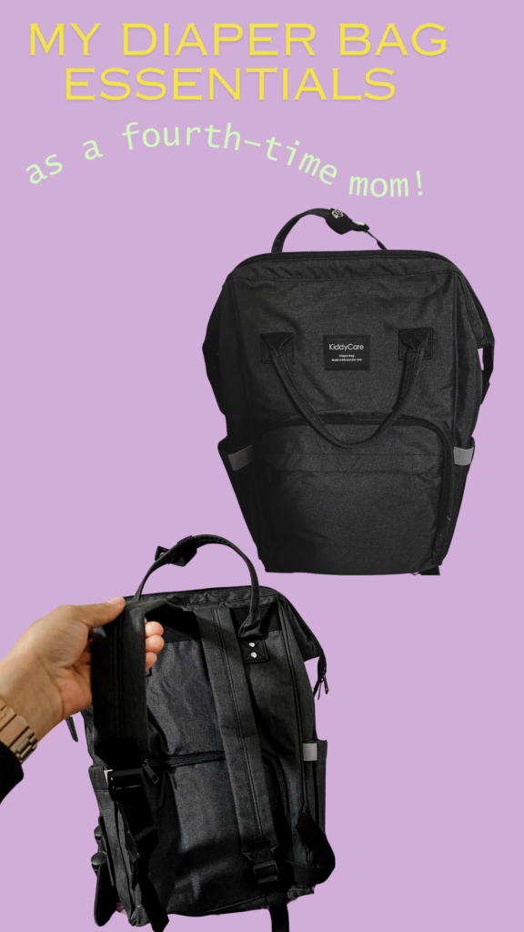 Dark Grey Backpack style Diaper bag on a purple backdrop